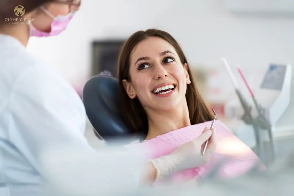 Smiling woman in a dental chair during a check-up