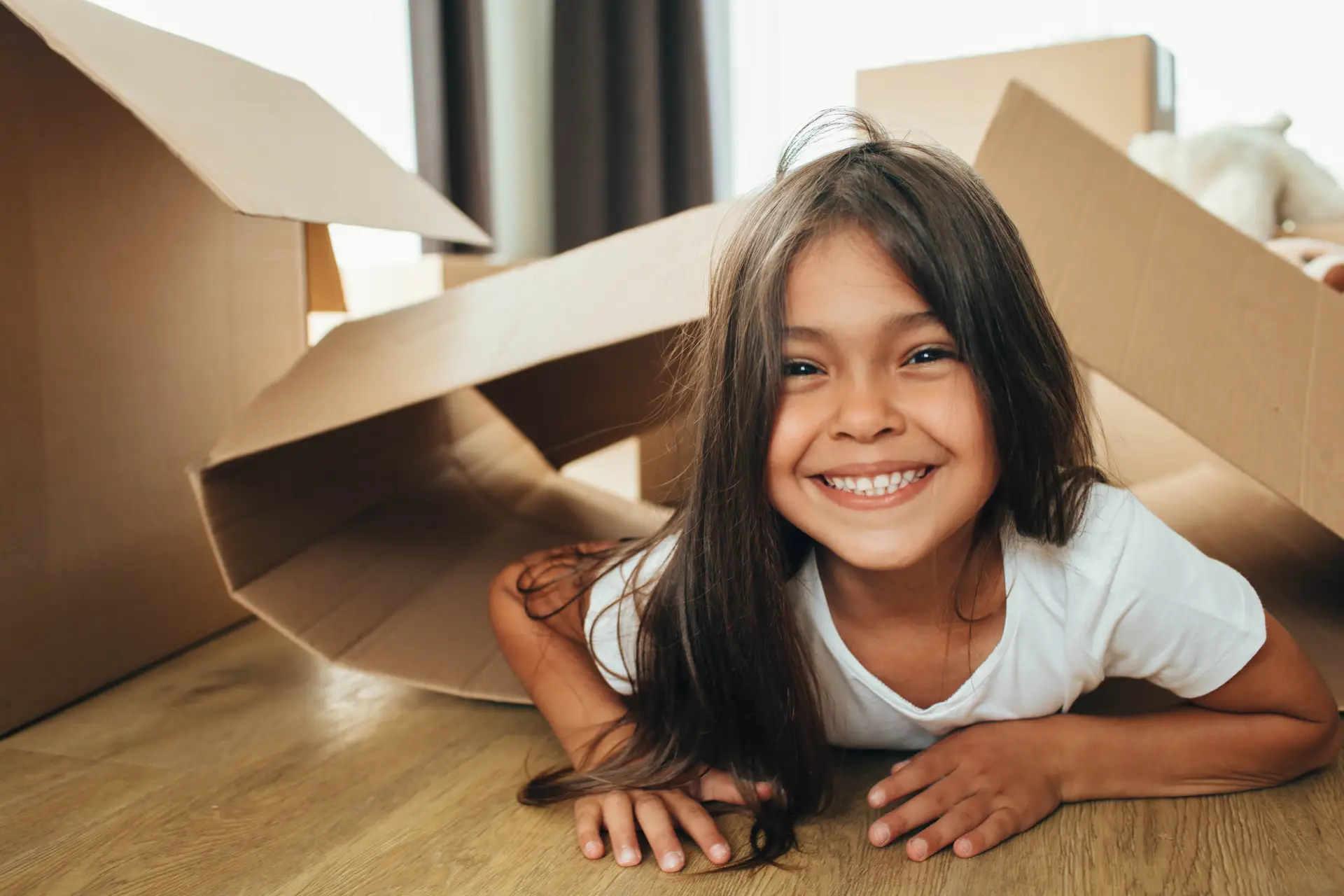 Smiling child after a preventive dental visit at Olympic Park Smiles Dental in Calgary